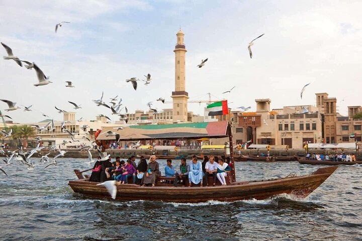 Experience the lush waters of Dubai Creek as you glide on a traditional abra surrounded by the sights and sounds of a historic city rich in culture and flavor.